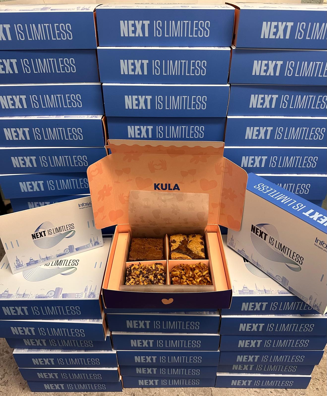 Open KULA brownie box with customized corporate branding sleeves