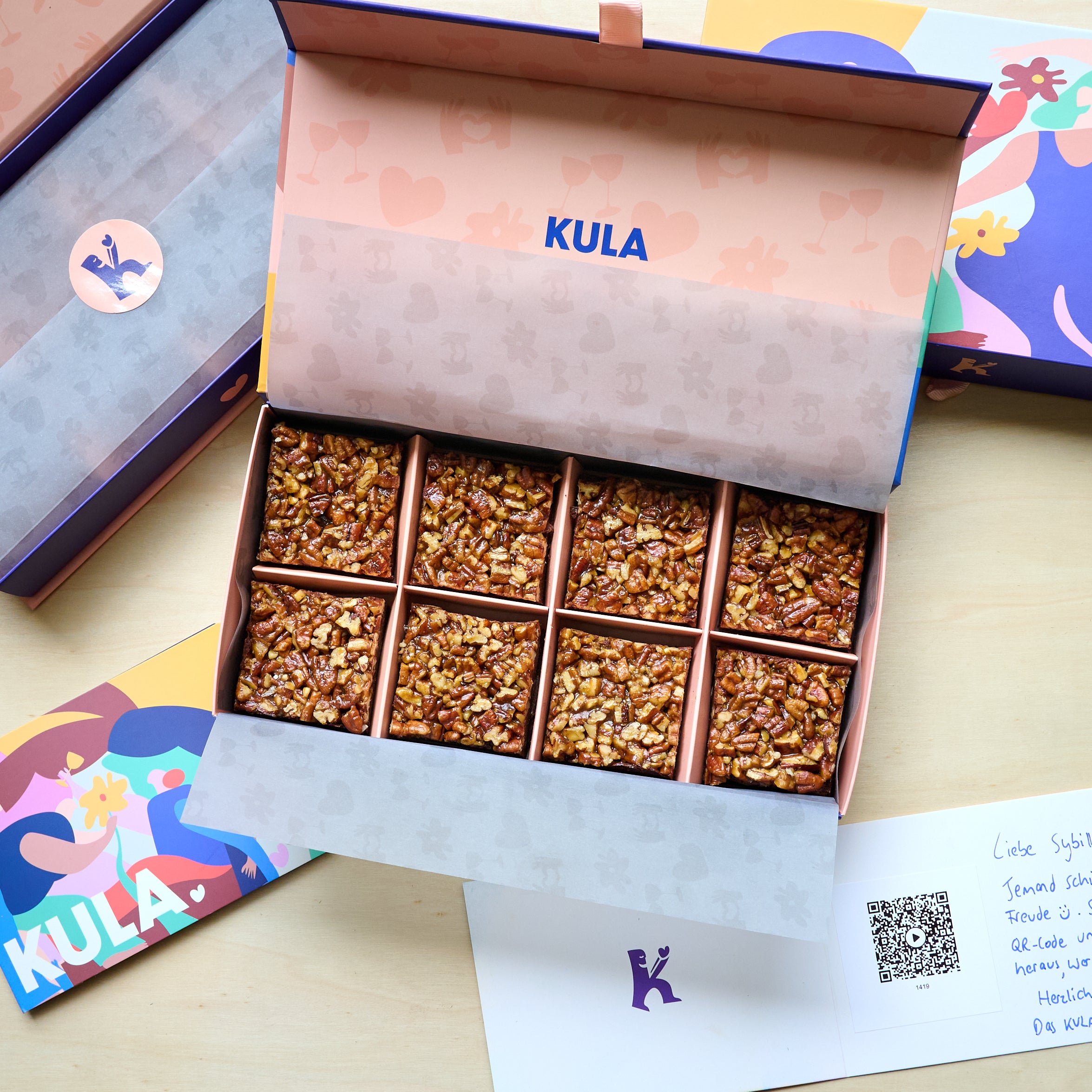 Vibrant KULA gift box with 8 salted caramel brownies, handwritten card, QR code with personal video message