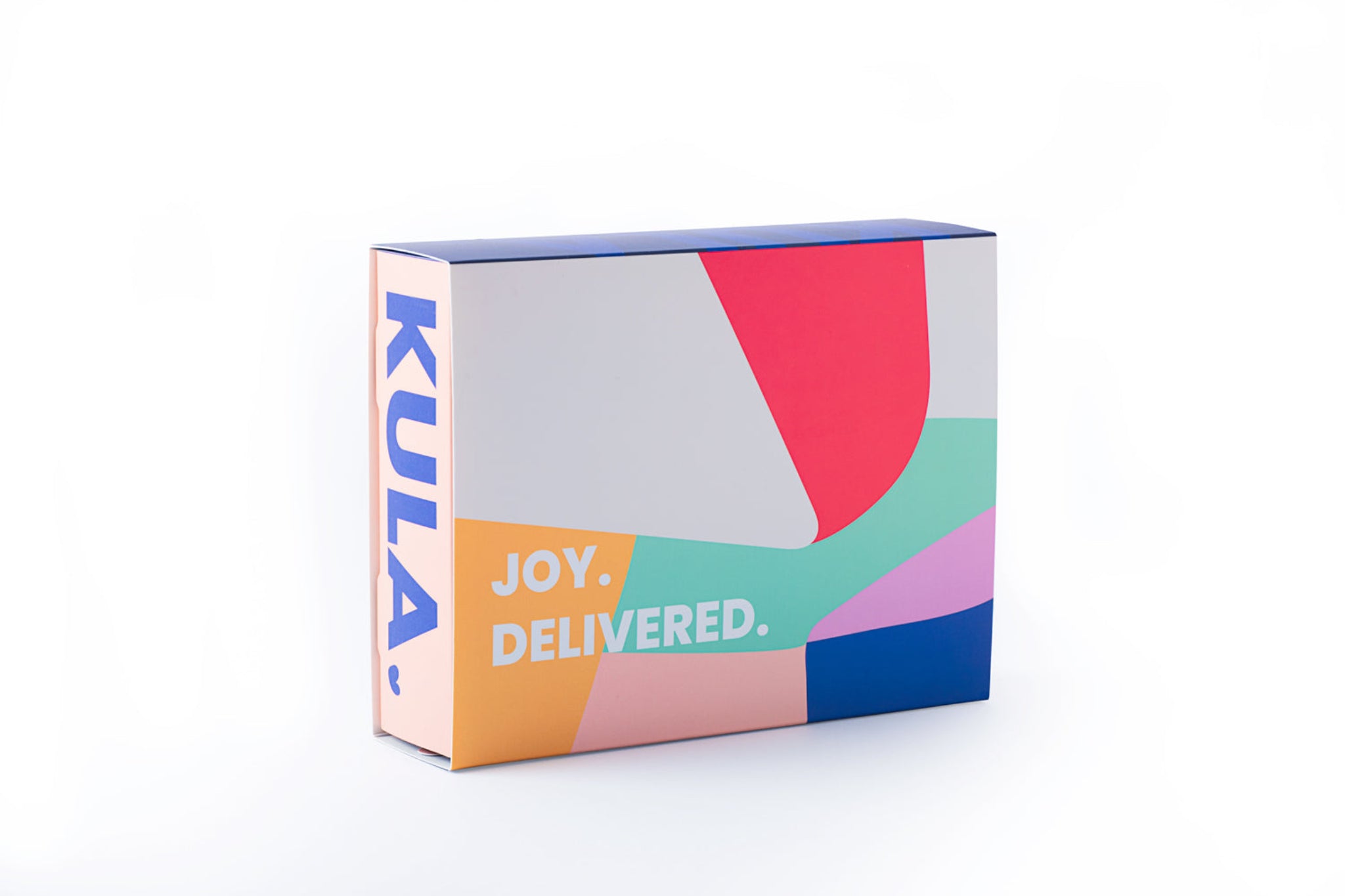 Vibrant KULA gift box featuring geometric designs and the slogan 'Joy. Delivered.' Perfect for thoughtful and colourful gifting experiences.