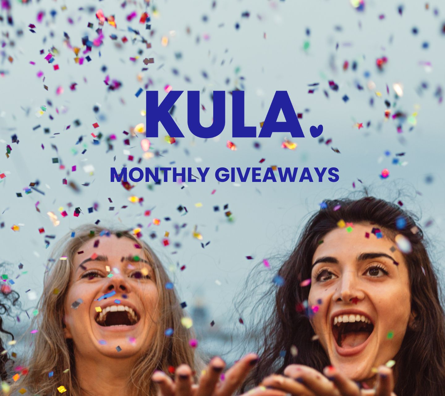 Group of women joyfully throwing confetti, celebrating KULA Monthly Giveaways and the spirit of spreading kindness.
