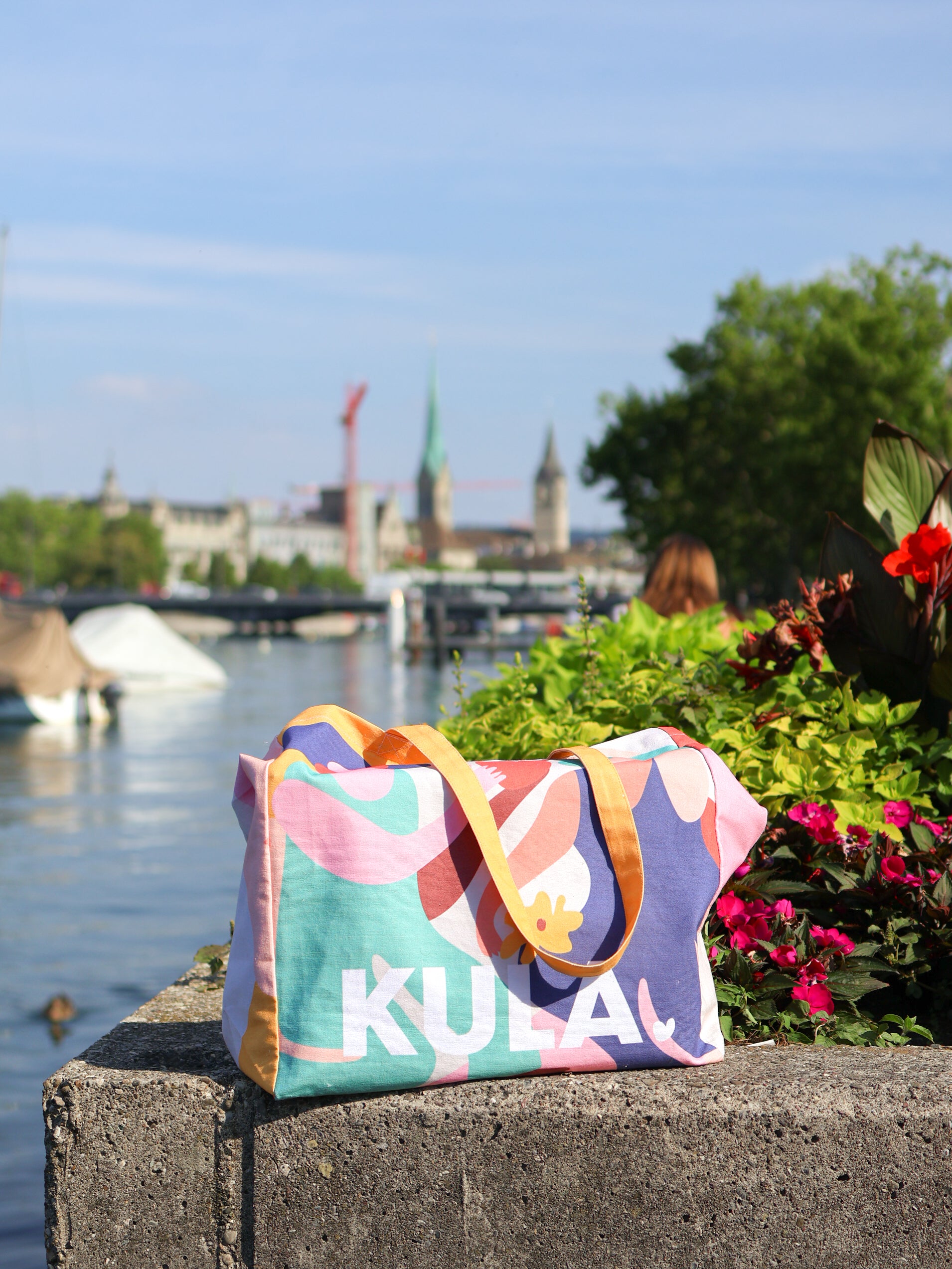 KULA tote bag on display by Limmat river in Zürich